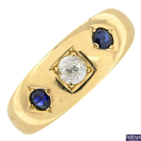 An early 29th century 18ct gold old-cut diamond and sapphire three-stone ring.
