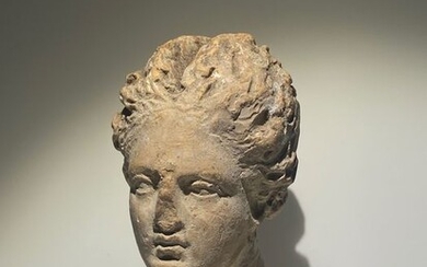 Ancient Greek Terracotta Nice Female Head Sculture. 3rd century BC. 10 cm H. Very fine quality.