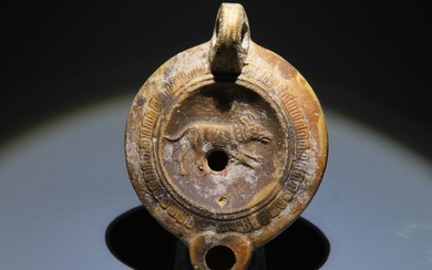 Ancient Roman Pottery Oil Lamp decorated with a dog. Intact. 9,6 cm L. Ex. Ernst Dumas, French officer in Tunisia 1903.