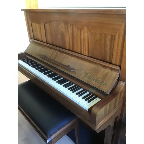 Bösendorfer (c1922) A 132cm upright piano in a walnut case....