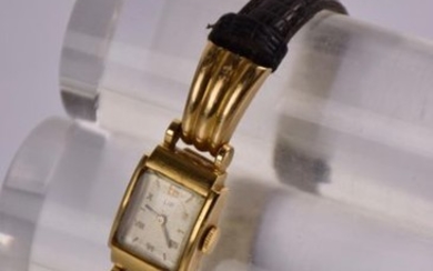 Bracelet montre de dame en or jaune à...