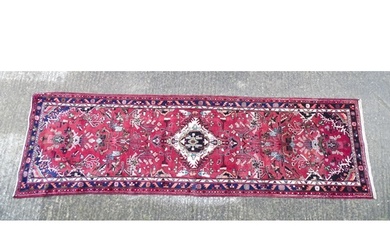 Carpet / Rug : A Persian Hamadan runner, the red ground with...
