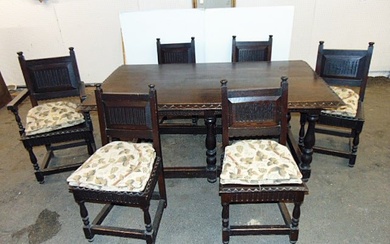 Carved oak dining table with 6 chairs, carved edge with stretcher base, table is 72" by 42.25"