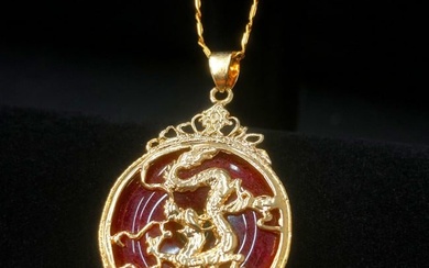 Chinese Carved Red Jade In Gold Dragon Mount