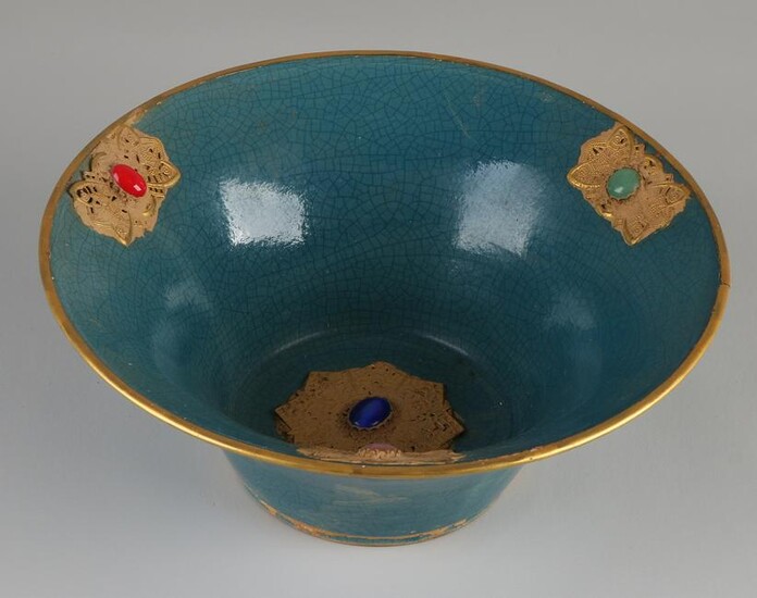 Chinese porcelain bowl with blue glaze and gold relief