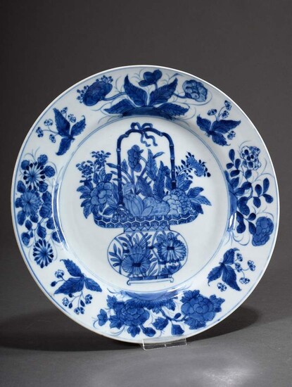 Chinese porcelain plate with blue painting decoration "flower basket", 18th century, Ø 26cm, burnt crack at the bottom, rim min. bumped