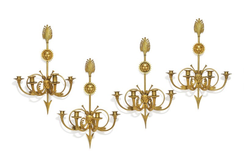 Claude Galle, attributed: A set of four French gilt bronze wall lights. Early 19th century. H. 64 cm. (4)