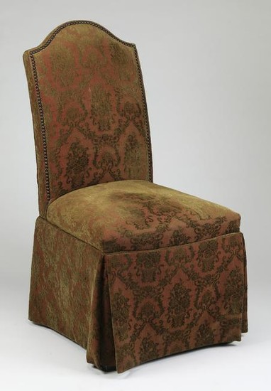 Damask upholstered chair with nailhead trim