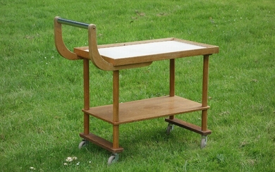NOT SOLD. Danish design: An oak and teak serving tabe, top with formica. C. 1970....