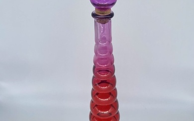 Decanter bottle made of colored glass. Art Deco 1980s. Himark. Collectible piece of Spanish glassblowers. Colored glass.