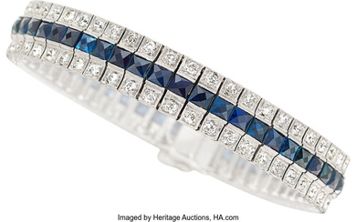 Diamond, Sapphire, Synthetic Sapphire, Platinum Bracelet Stones: Transitional-cut diamonds...