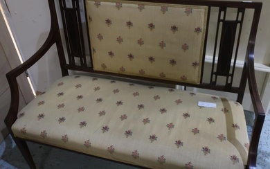 Edwardian mahogany inlaid two seat settee with upholstered seat...