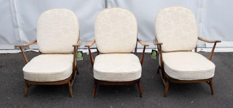 Ercol: Three mid 20th century easy arm chairs with fabric...