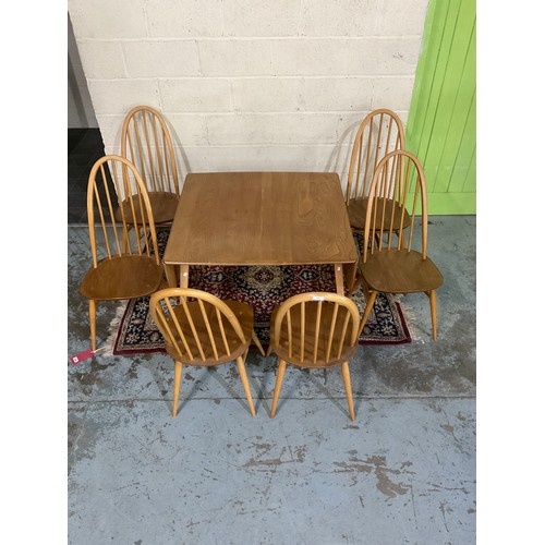 Ercol light elm drop leaf dining table, on outsplayed square...