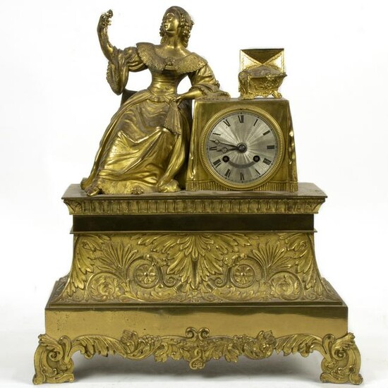 French gilt metal statue clock, the seated female