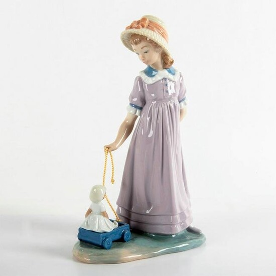 Girl with Toy Wagon 1005044 - Lladro Porcelain Figurine