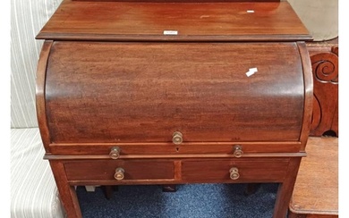 LATE 19TH CENTURY MAHOGANY CYLINDER BUREAU OPENING TO FITTED...