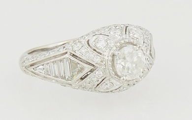 Lady's 18K White Gold Dinner Ring, with a .72 ct. round