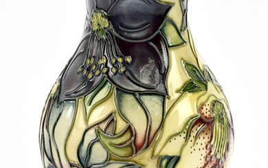 NICOLA SLANEY FOR MOORCROFT; a vase with flared neck decorated...