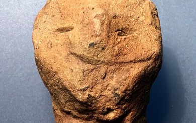 Neolithic Terracotta Exceptional Head of a Votive Figurine with an Unique Wide Smile.