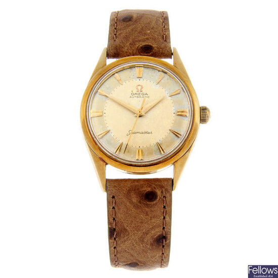 OMEGA - a yellow metal Seamaster wrist watch, 33mm.