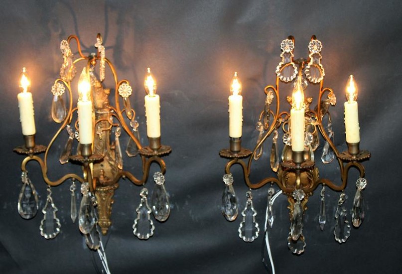 Pair of gilt bronze and crystal sconces