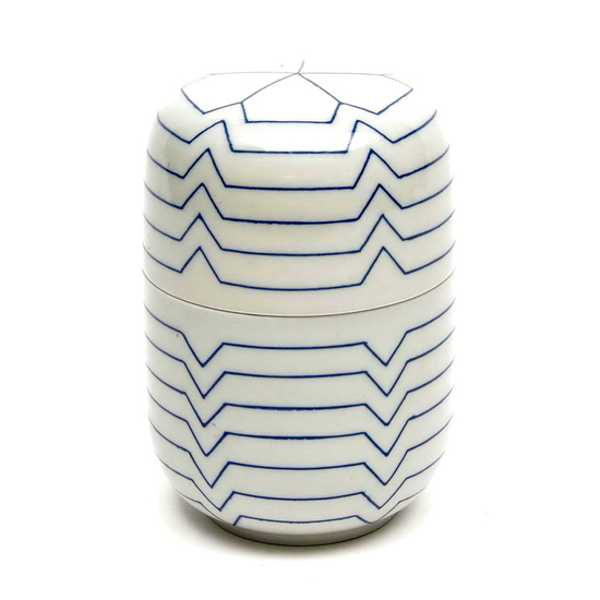 Porcelain covered box with blue linear geometrical decoration,...