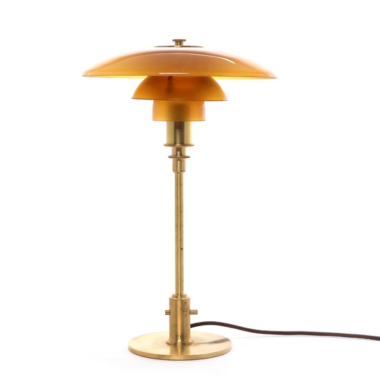 Poul Henningsen: “PH-3/2”. Table lamp with frame of brass. Shades of amber coloured glass. Shades of amber coloured glass.