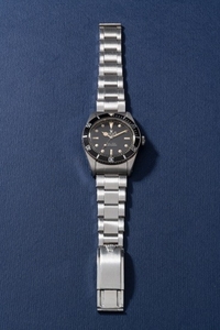 Rolex, Ref. 5508, repeated on the inner caseback with II.62 An extremely attractive and rare stainless steel wristwatch with center seconds, no crown guards, "exclamation mark" black glossy dial and bracelet