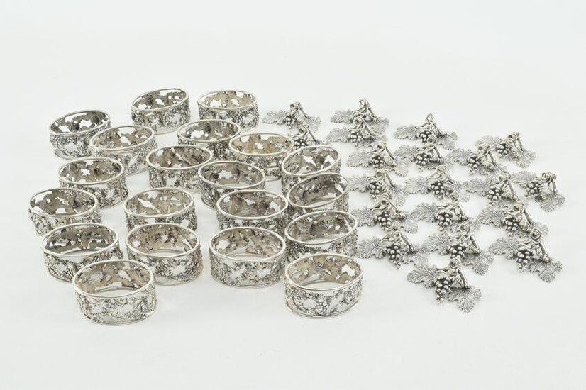 Set of 20 sterling silver napkin rings with 24 silver