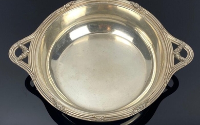 Silver-handled vegetable dish with silver handles, encrypted on the body.