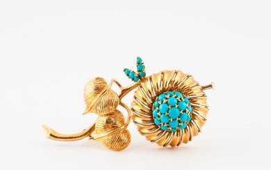 Sunflower" brooch in yellow gold (750) with pistil and some leaves decorated with small turquoise cabochons in grain setting.