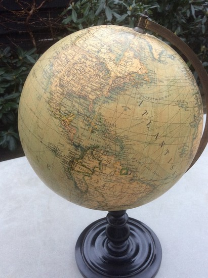 World Globe on wooden base. Published by Karl Stender, Copenhagen. 20th century. H. 45 cm.