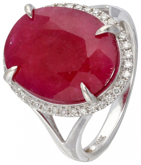 14K. White gold entourage ring set with approx. 8.50 ct. ruby and approx. 0.19 ct....