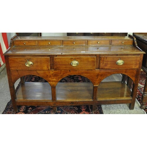 19th Century Welsh oak and other mixed woods dresser base ha...
