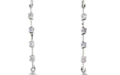 A pair of cultured pearl and cubic zirconia earrings.
