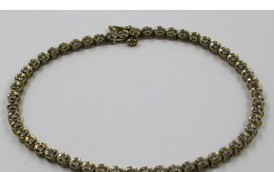 9ct Yellow gold diamond set line bracelet, 5.5g