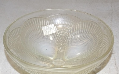 A 1930 Lalique bowl in the 'Coquilles' pattern, with shell-m...