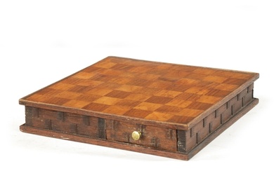 A 19TH CENTURY CARVED WOOD DOUBLE SIDED CHESS BOARD with pul...