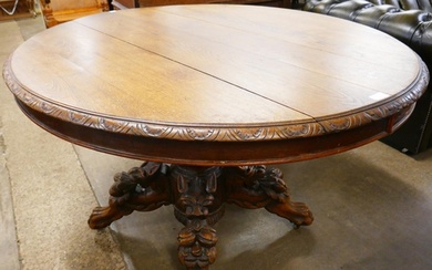 A 19th Century French carved oak oval centre table