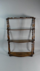 A 19th Century Set of Walnut Hanging Wall Shelves with Serpe...