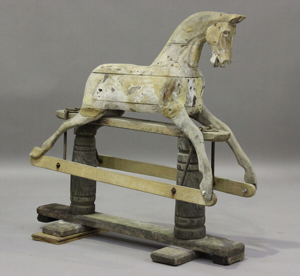 A 19th century carved wooden rocking horse, height 85cm, length 87cm (faults).