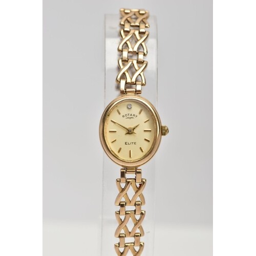 A 9CT GOLD ROTARY WRISTWATCH WITH BOX, the oval face with ba...