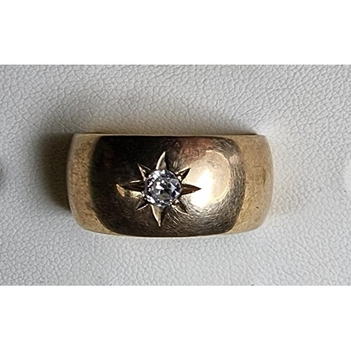A 9ct gold and diamond band ring, size V, 6.7 gms