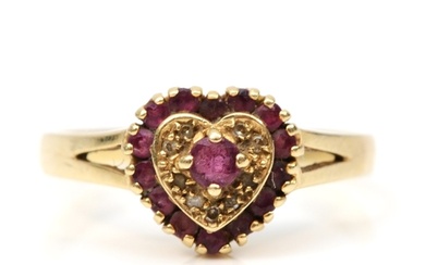 A 9ct gold ruby and eight cut diamond heart shaped cluster r...