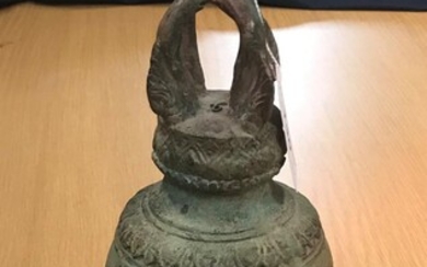 A Chinese Taoist type bronze bell with crown top...