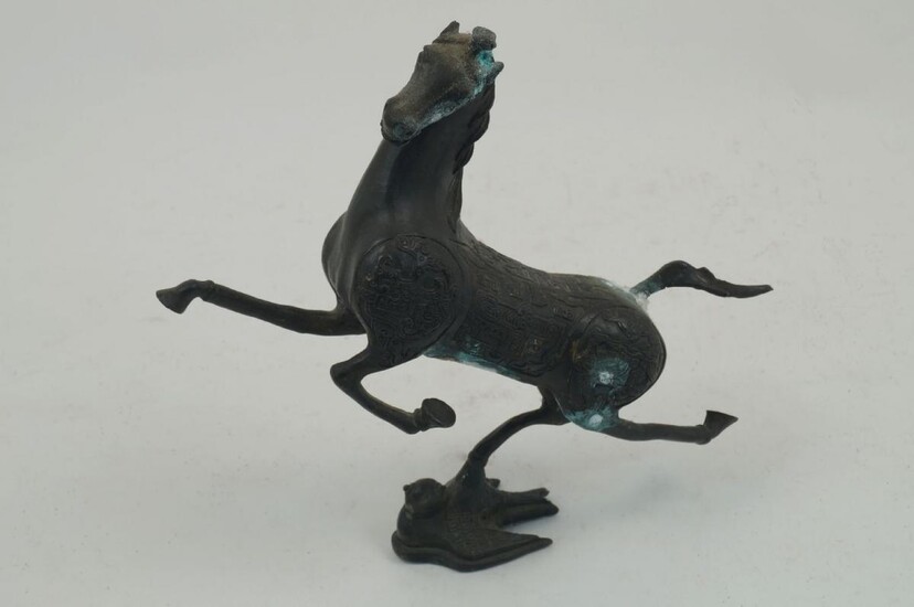 A Chinese bronze figure of a horse, 20th century, modelled...