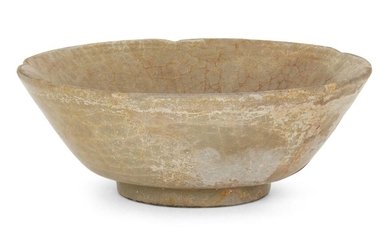 A Chinese grey stoneware celadon glazed bowl, Yuan-Ming dynasty, of five-lobed form with flared sides raised on short circular foot, 11cm diameter