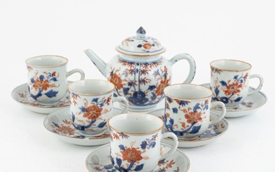 A Chinese imari export porcelain teapot and five cups with saucers, Qing dynasty, Qianlong (1736-95).