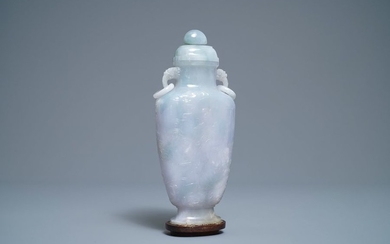 A Chinese jade 'immortals' vase and cover, 19th...